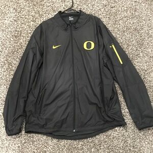 Nike Oregon Ducks lightweight jogger jacket with arm pocket. Size 2XL.